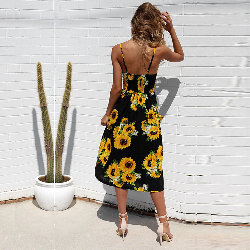 Davina | Zomer midi jurk met knopen en zakken
